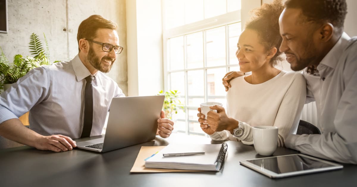 Family couple consultations with a lawyer or insurance agent. Law and insurance.