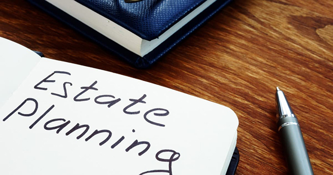 Estate planning handwriting sign on the sheet.