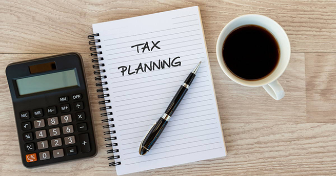 Tax Planning text on Note pad